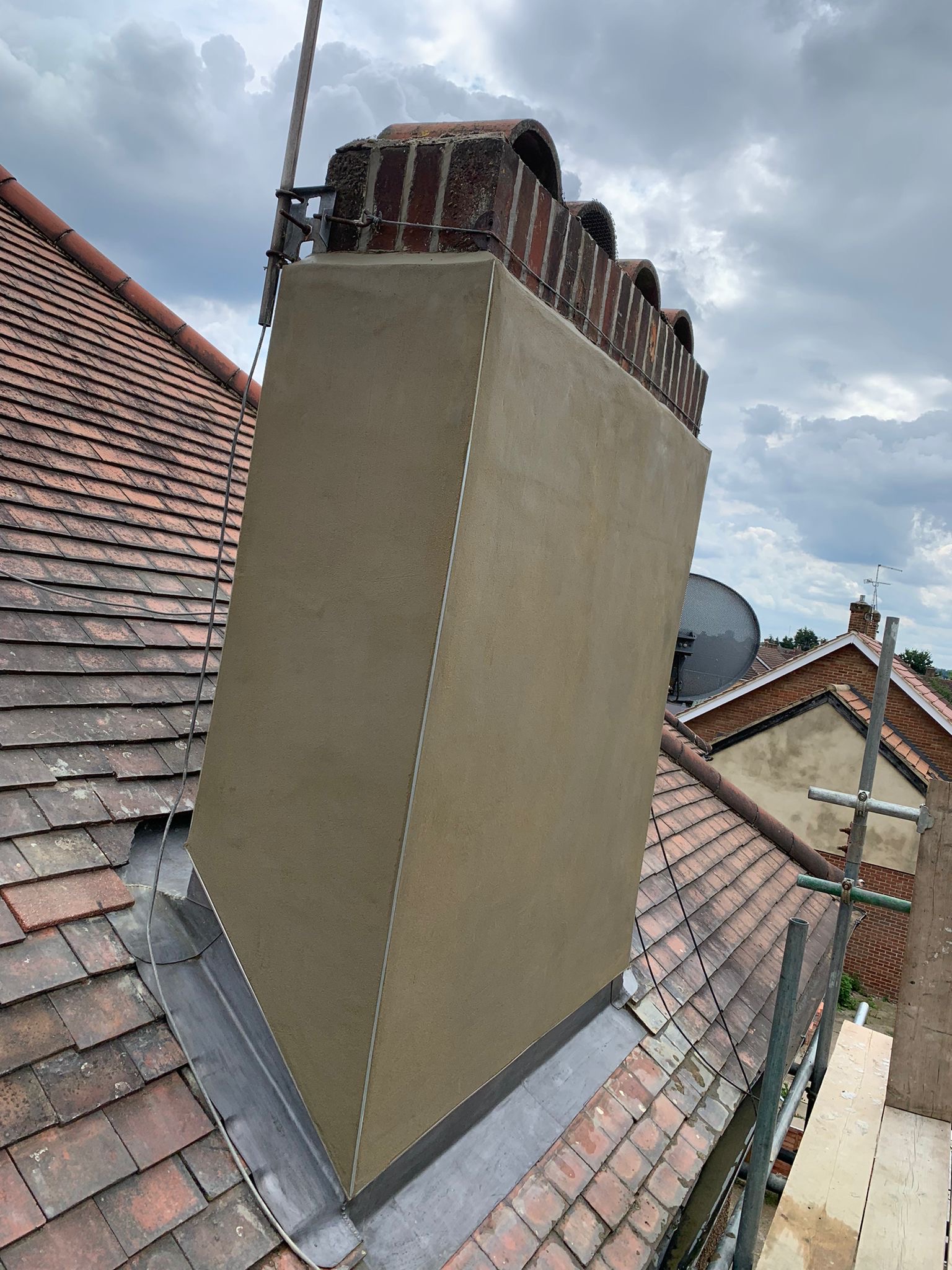 Flashings, repointing, stack removal and rendering.
